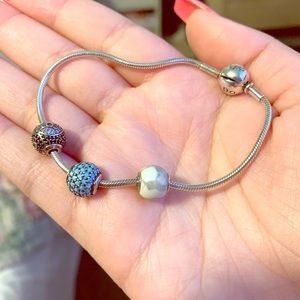Pandora essence bracelet with charms